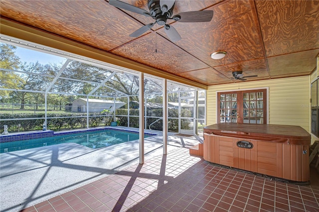 unfurnished sunroom featuring a jacuzzi and wood ceiling