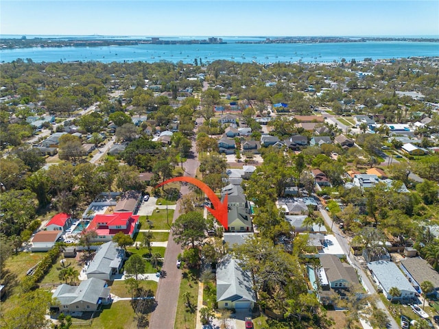 aerial view with a residential view and a water view