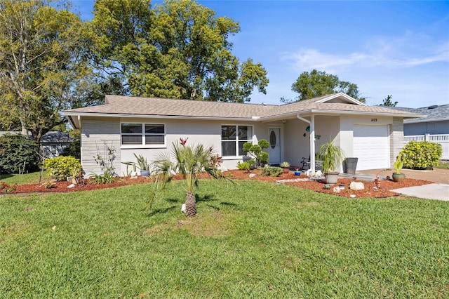 single story home with brick siding, stucco siding, an attached garage, and a front yard