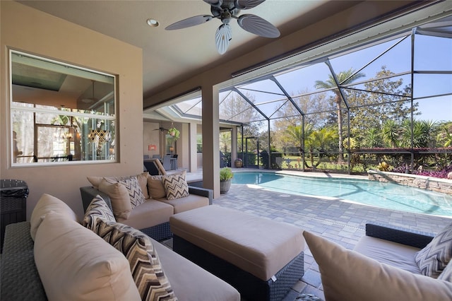 exterior space with recessed lighting, ceiling fan, and a sunroom