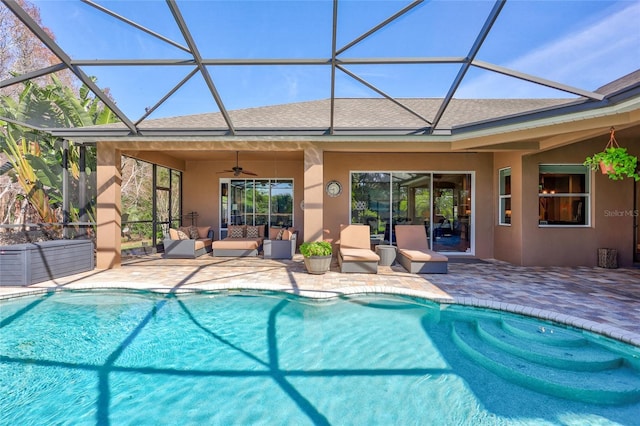 outdoor pool with a lanai, a patio, ceiling fan, and outdoor lounge area