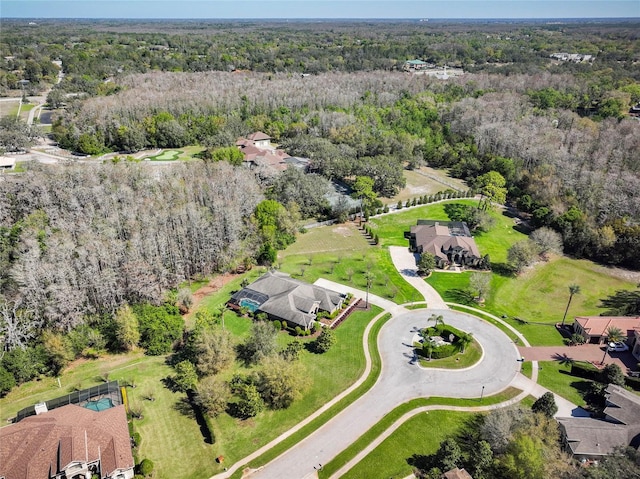 bird's eye view featuring a view of trees