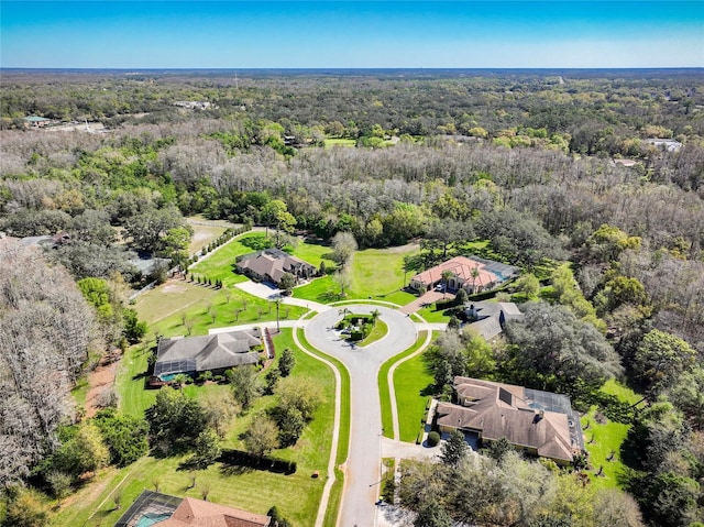 drone / aerial view with a forest view