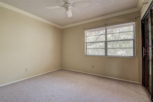 unfurnished room featuring a textured ceiling, ornamental molding, baseboards, and light carpet