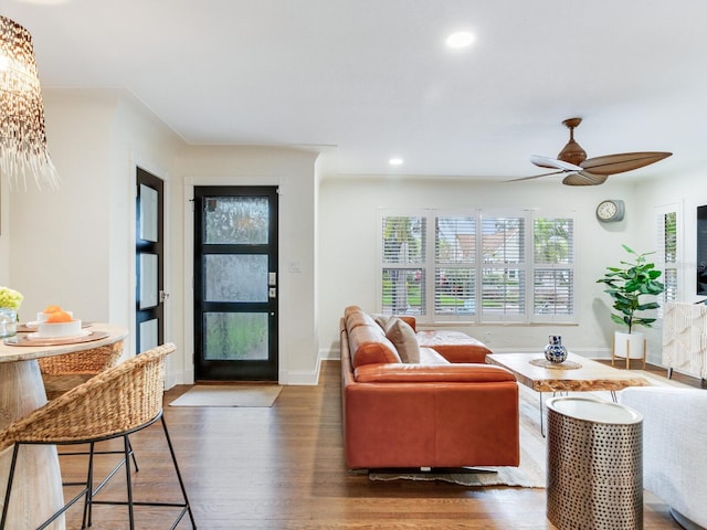 living room featuring recessed lighting, wood finished floors, baseboards, and ceiling fan