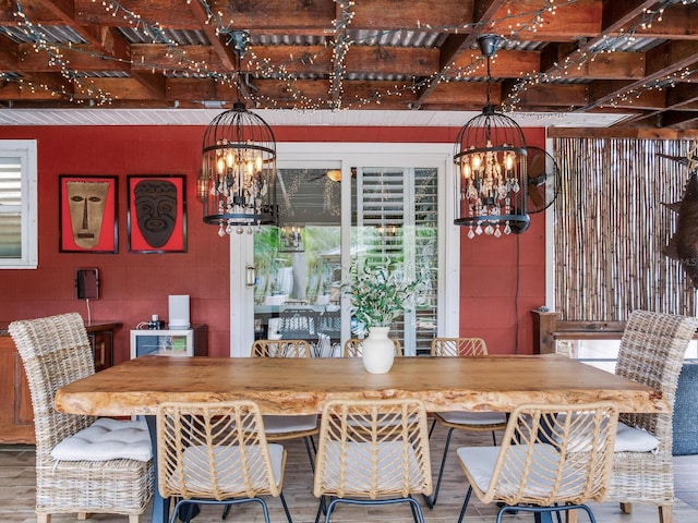 dining room featuring an inviting chandelier and wood finished floors