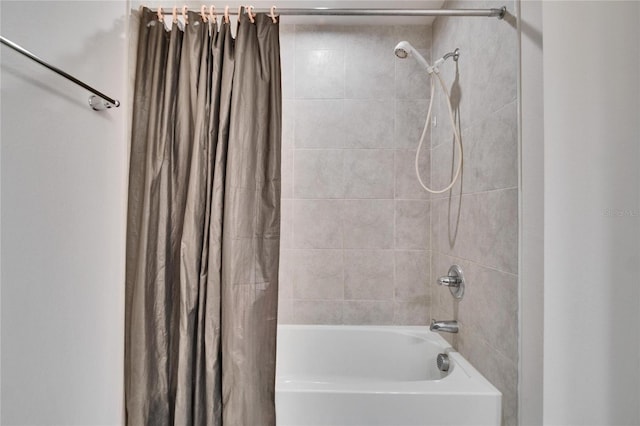 bathroom featuring shower / bath combination with curtain