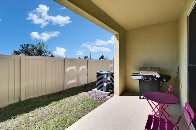 view of patio / terrace featuring central air condition unit, a fenced backyard, and a grill