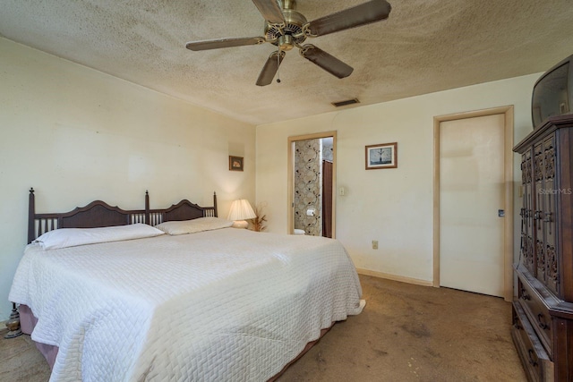 carpeted bedroom featuring visible vents, baseboards, a textured ceiling, and ceiling fan