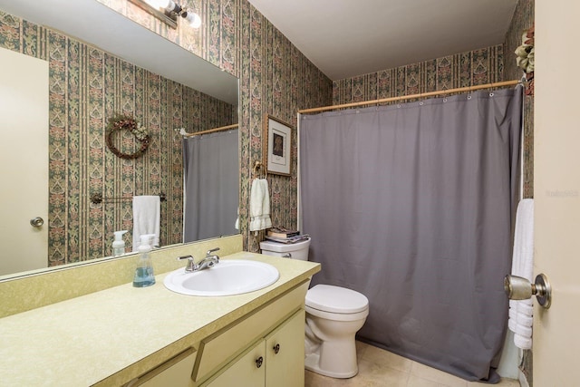 full bath with curtained shower, wallpapered walls, toilet, tile patterned floors, and vanity