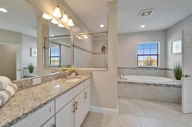 bathroom with vanity, recessed lighting, a tile shower, tile patterned flooring, and a garden tub