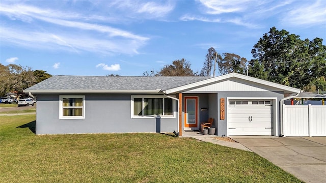 ranch-style house featuring stucco siding, fence, a garage, driveway, and a front lawn