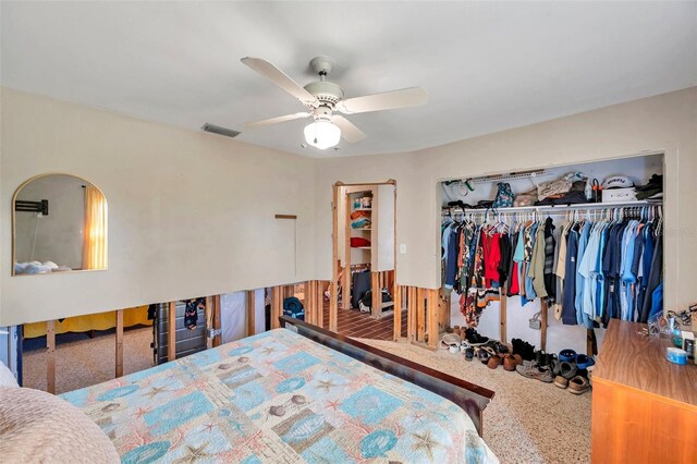 bedroom featuring ceiling fan, a closet, and visible vents