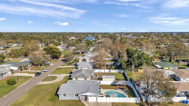 birds eye view of property with a residential view