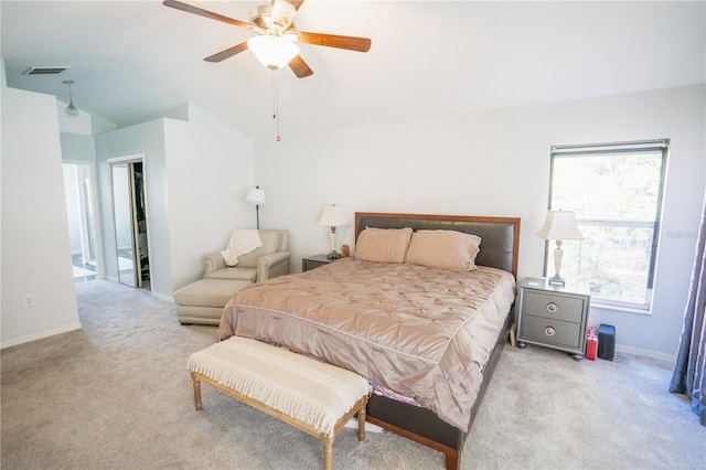 bedroom featuring vaulted ceiling, carpet flooring, baseboards, and visible vents