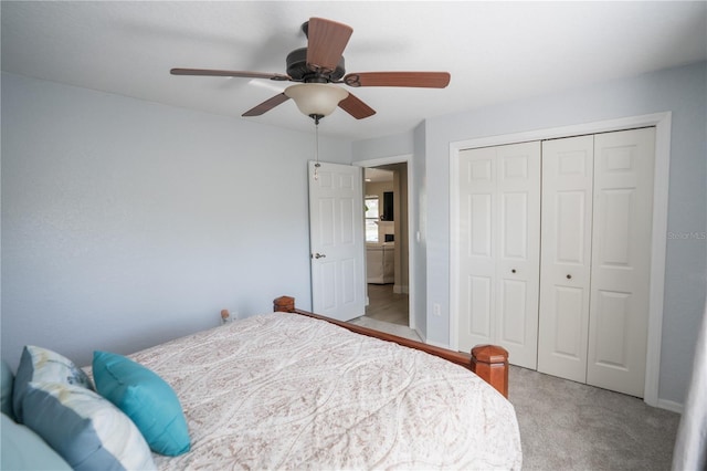 bedroom featuring a closet, a ceiling fan, and carpet floors