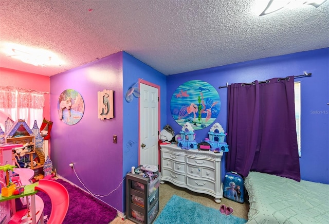 carpeted bedroom featuring a textured ceiling