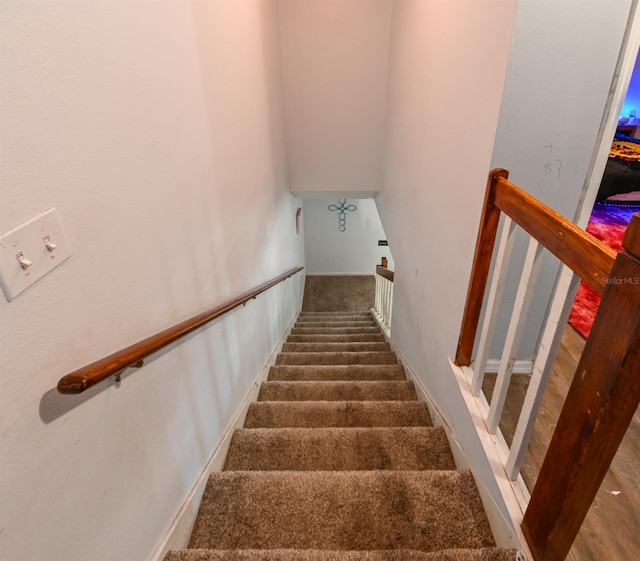 stairway with carpet floors