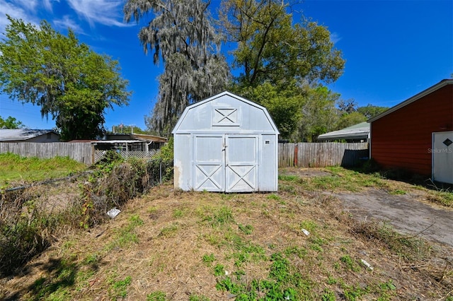 view of shed featuring a fenced backyard