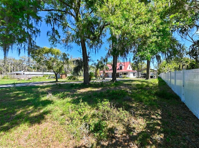 view of yard featuring fence