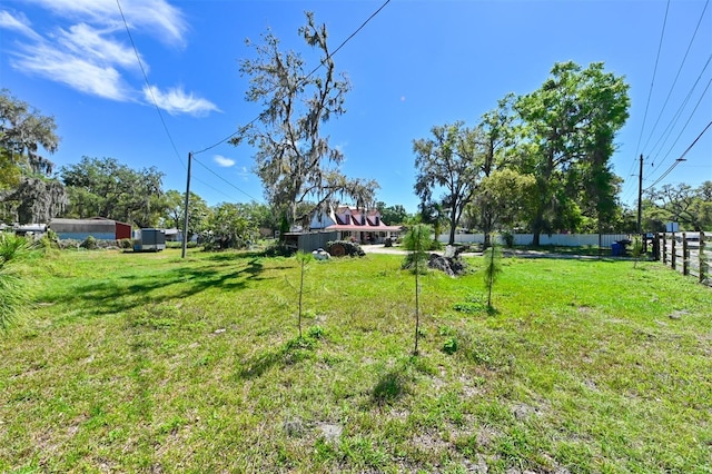 view of yard with fence