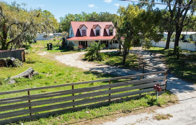 view of gate with fence