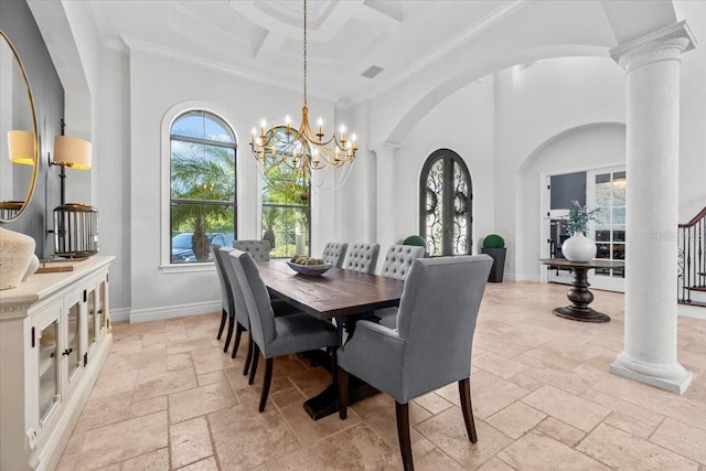 dining space featuring baseboards, arched walkways, ornate columns, and stone tile flooring