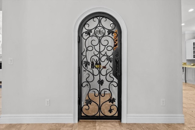 room details with recessed lighting, baseboards, and arched walkways