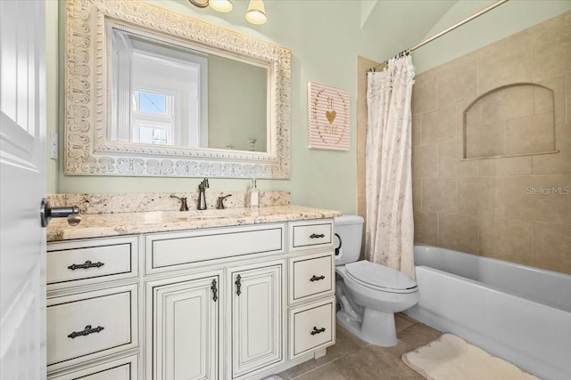 full bathroom featuring tile patterned flooring, toilet, vanity, and shower / tub combo