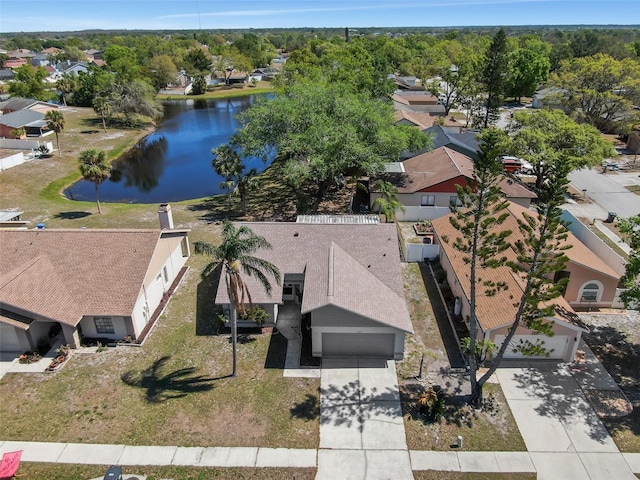 aerial view featuring a water view and a residential view