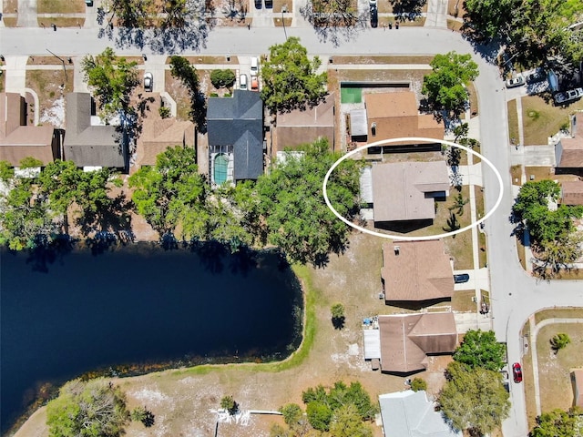 birds eye view of property featuring a residential view and a water view