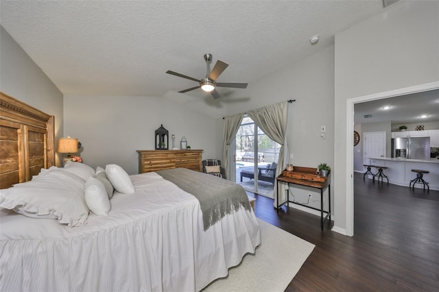 bedroom with access to outside, wood finished floors, stainless steel fridge with ice dispenser, lofted ceiling, and ceiling fan