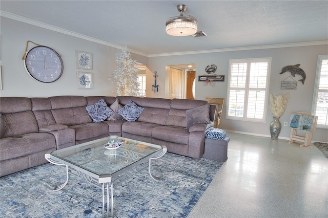 living area featuring crown molding, speckled floor, baseboards, and a textured ceiling