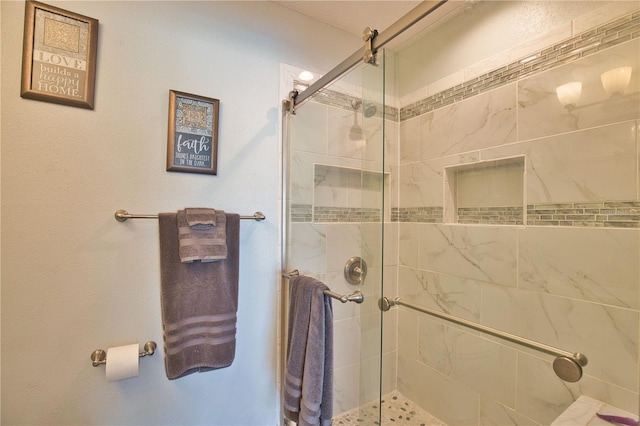 full bathroom featuring a shower stall