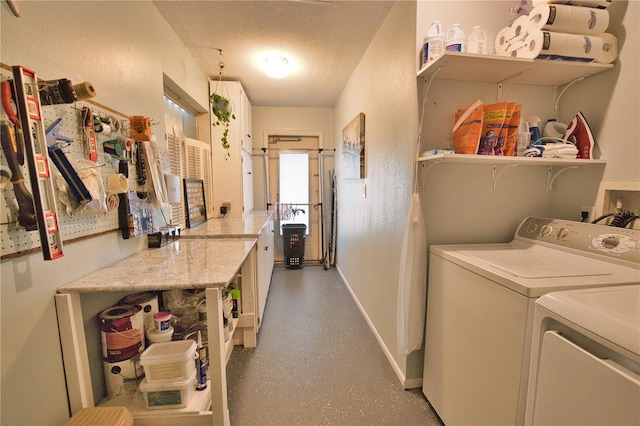 washroom with baseboards, laundry area, a textured wall, independent washer and dryer, and a textured ceiling