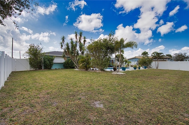 view of yard featuring a fenced backyard