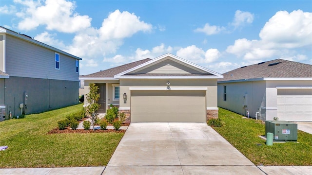 view of front of home featuring concrete driveway, a front yard, stucco siding, a garage, and stone siding