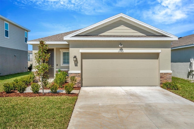 view of front of house with stone siding, stucco siding, driveway, and an attached garage