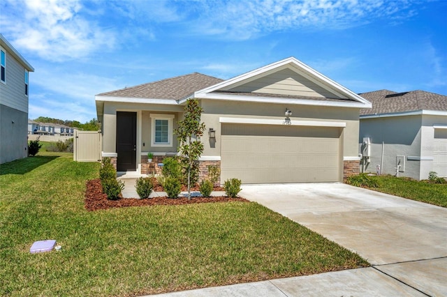 view of front facade with a front lawn, concrete driveway, stucco siding, a garage, and stone siding