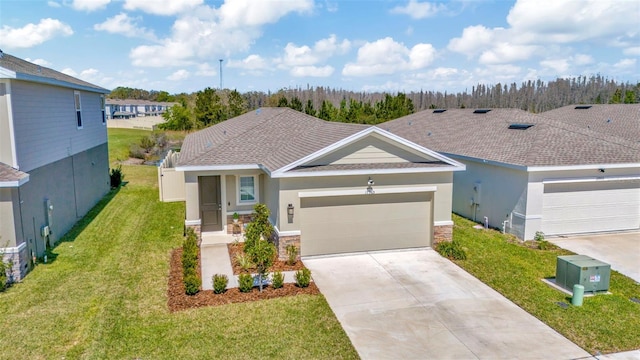 ranch-style house with stucco siding, a shingled roof, concrete driveway, an attached garage, and a front yard