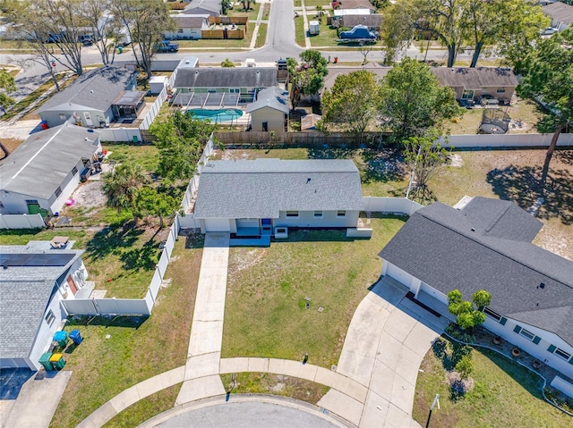 birds eye view of property with a residential view