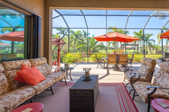 view of patio / terrace featuring outdoor dining area, a lanai, and outdoor lounge area