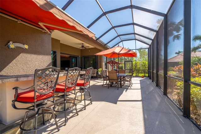 exterior space featuring ceiling fan