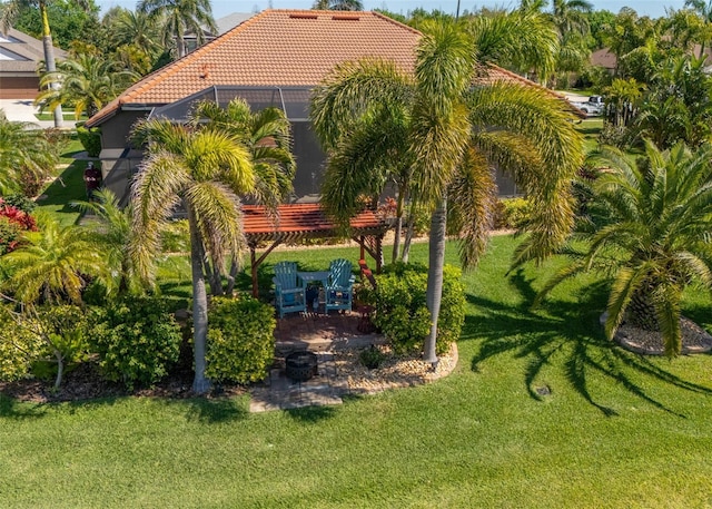 view of yard featuring a lanai and a patio