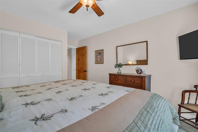 bedroom with a closet and a ceiling fan