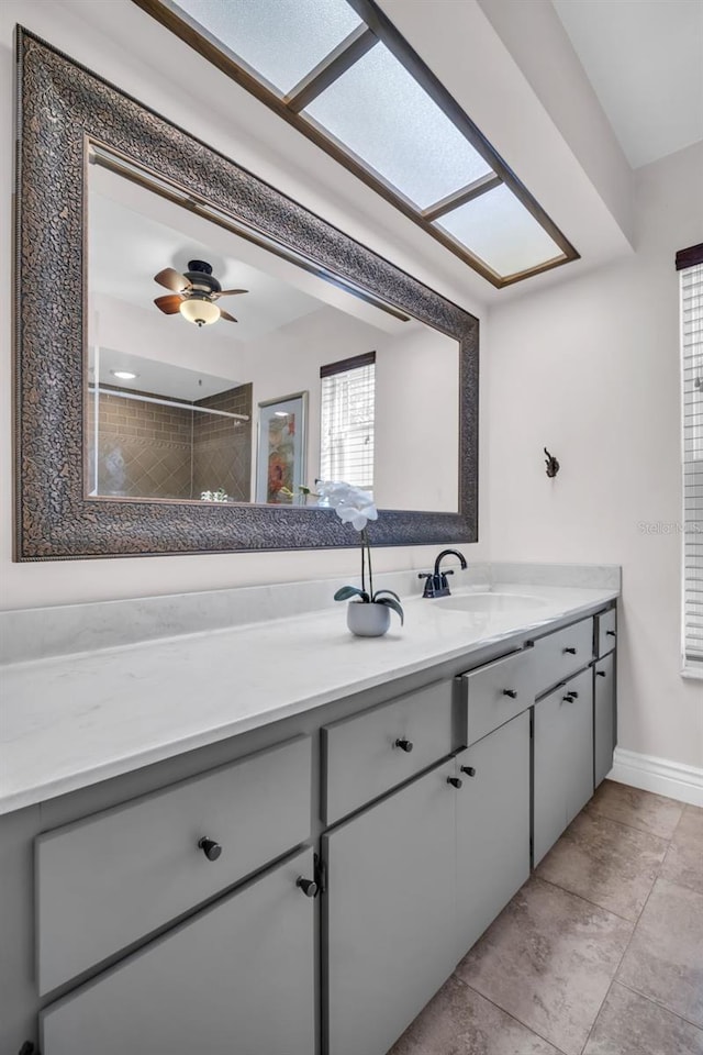 bathroom featuring vanity and baseboards