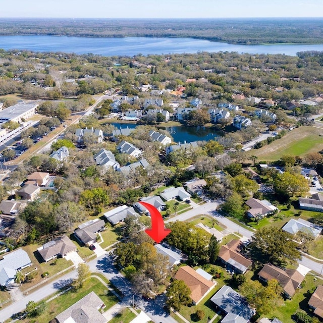 aerial view featuring a residential view and a water view