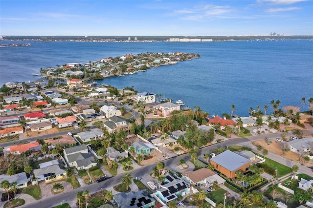 aerial view with a residential view and a water view