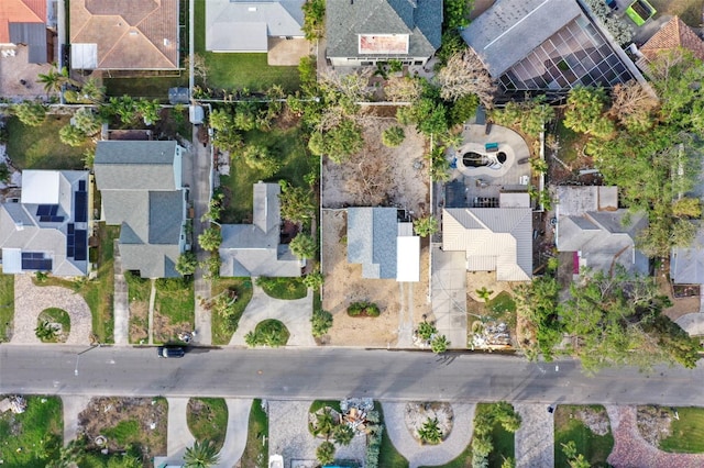 birds eye view of property with a residential view