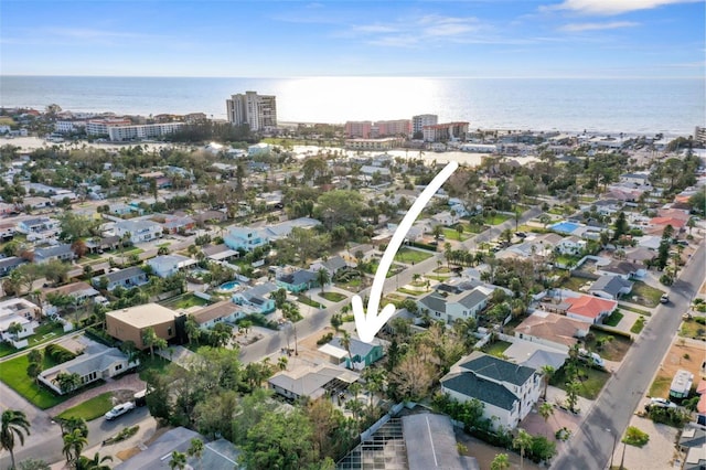 bird's eye view featuring a view of city and a water view